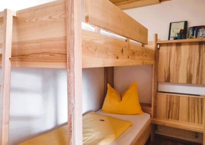 Kleines, aber feines Zimmer mit Stockbett. _Ferienwohnungen PerhoferSchlafzimmer mit Stockbett_Ferienwohnung Abendsonne_Urlaub am Bauernhof Perhofer.